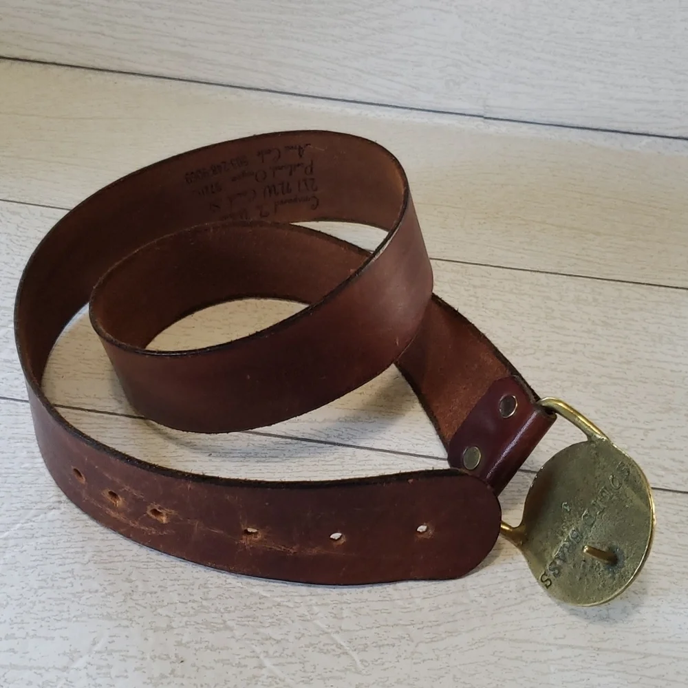 Compared to what brown leather strap with gold buckle